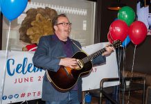 Musician Rick Fines, pictured at the March 30th announcement, is one of many local performers who will be entertaining revellers during Canada 150 celebrations in downtown Peterborough on June 29 and 30 (photo: Peterborough DBIA)