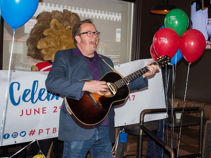 Musician Rick Fines, pictured at the March 30th announcement, is one of many local performers who will be entertaining revellers during Canada 150 celebrations in downtown Peterborough on June 29 and 30 (photo: Peterborough DBIA)