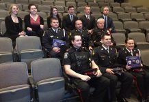 The police officers who received the Outstanding Police Officer Service Award with the students from Fleming College's Police Foundations program who presented the awards (photo courtesy of Fleming College)