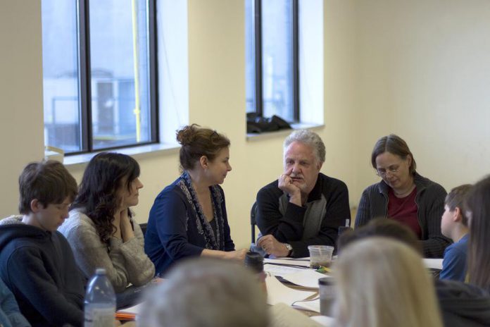 New Stages Theatre Company's production of Thornton Wilder's Our Town features a cast of 19 performers, some pictured here during a cast read-through: George Knechtel, Megan Murphy, director Linda Kash, Randy Read, stage manager Esther Vincent, and Logan Sword. The play runs April 28 to May 6 at the Market Hall in Peterborough. (Photo: Lindsay Unterlander / Adam Martignetti)