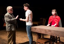 Randy Read as The Stage Manager with Matthew Finlan as George Gibbs and Bethany Heemskerk as Emily Webb in New Stages' production of Thornton Wilder's "Our Town", on now until May 6 at the Market Hall in Peterborough. (Photo: Andy Carroll)