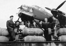 4th Line Theatre's new play "Bombers: Reaping the Whirlwind" by David S. Craig tells the story of a Canadian heavy bomber pilot serving with No. 6 Group RCAF of Bomber Command during the Second World War. Pictured are the aircrew and groundcrew of No. 428 Squadron (also known as the "Ghost Squadron", one of the No. 6 Group RCAF squadrons) with their Avro Lancaster, which flew the squadron's 2000th sortie, a raid on Bremen in Germany. (Photo: Library and Archives Canada)