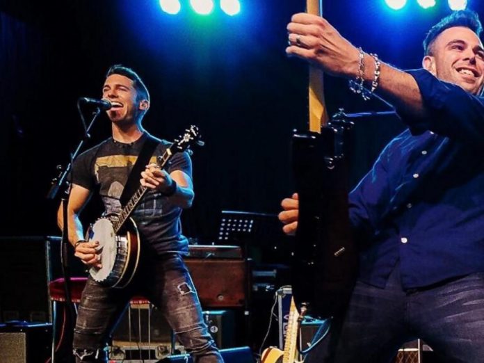 Jordan Honsinger (banjo, vocals) and Trevor MacLeod (lead guitar) of country rockers Cold Creek County, who headline the Country Wild Music Festival on June 3 at Victoria Park in Cobourg. (Photo: Cold Creek County / Instagram)