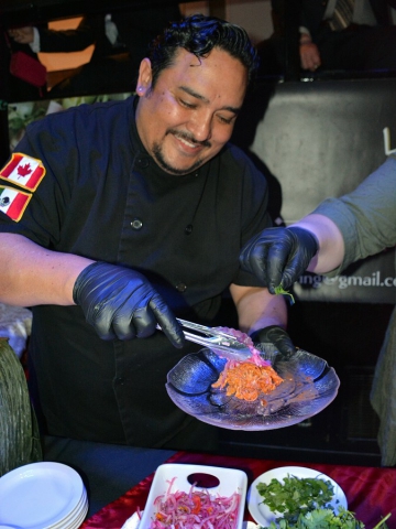 Martin Carbajal of La Mesita Catering offered pulled pork garnished with habanero pickled onions and cilantro. (Photo: Eva Fisher / kawarthaNOW.com)