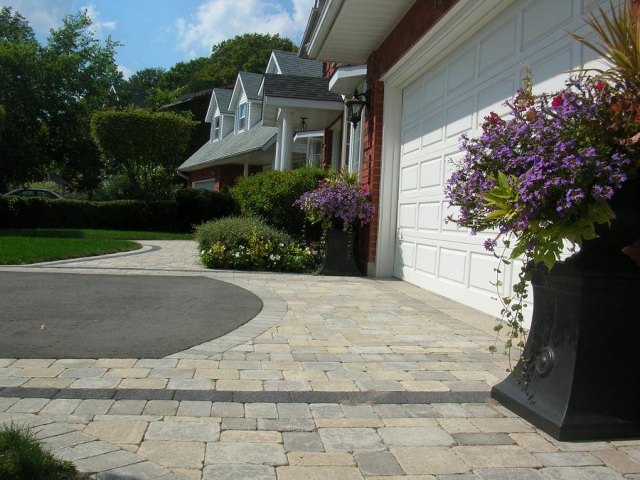 A driveway can be a design feature. Cavan Hills Landscaping specializes in interlocking paver stonework. (Photo: Cavan Hills Landscaping)