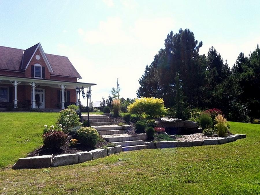 Low-maintenance landscaping means less work and more time enjoying your yard. (Photo: Kawartha Lakes Landscaping)