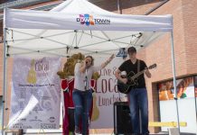 Local singer-songwriter Missy Knott performs at the May 11th announcement of the line-up for Live and Local Lunches, a series of free concerts in the courtyard of Peterborough Square in downtown Peterborough. Knott will be opening the summer-long series on Friday, May 26th. (Photo: Peterborough DBIA)