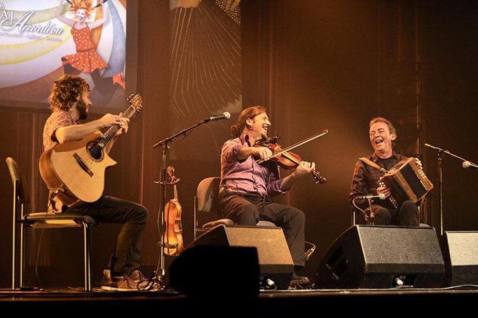 Adam Dobres (guitar), Pierre Schryer (fiddle), and Dermot Byrne (accordian) are the award-winning trio 3TíR, who will be performing foot-stomping traditional music at the Market Hall in Peterborough on July 11. (Photo: Carrefour mondial de l'accordéon)