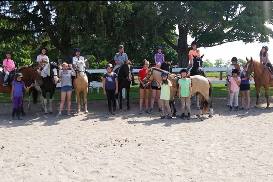 At the end of the week, campers feature the skills and tasks they've learned from the program on what's called "Show Off" day for family and friends. (Photo: Heather Leach / Seven Pines Stables)