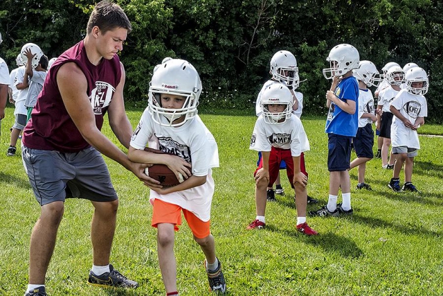 Football Camp allow kids to learn basic football instruction, in both offence and defense,  and strives to help them improve upon their football skills. (Photo: City of Peterborough Recreation Division)