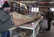 Using traditional techniques, members of the Miawpukek First Nation from Newfoundland have built a 22-foot birch bark canoe they will present to The Canadian Canoe Museum on National Aboriginal Day (June 21). Described by the Mi'kmaq word "gwitna'q", which means "go by canoe", the canoe represents the reconciliation of aboriginals with the Canadian government on the 150th anniversary of Confederation. (Photo: Miawpukek First Nation)