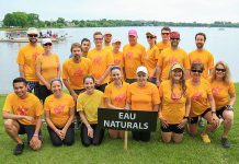 Glenn Goodwin (middle back), who has paddled with the Eau Naturals dragon boat team for 15 years, will paddle for the second time with two generations of his family.