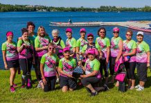 Leah Carroll (holding the trophy) celebrating success with her Survivors Abreast team-mates. Survivors Abreast hosts Peterborough's Dragon Boat Festival, where the team will be paddling for its 17th year on June 10, 2017.