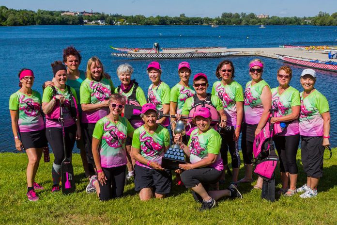 Leah Carroll (holding the trophy) celebrating success with her Survivors Abreast team-mates. Survivors Abreast hosts Peterborough's Dragon Boat Festival, where the team will be paddling for its 17th year on June 10, 2017.