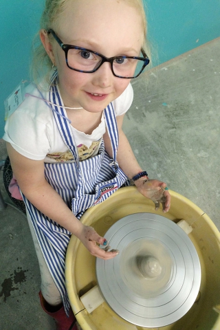 Using a potter’s wheel is one of the camper’s favourite experiences, where they get their hands dirty by forming, shaping and molding soft clay. (Photo: Art School of Peterborough)