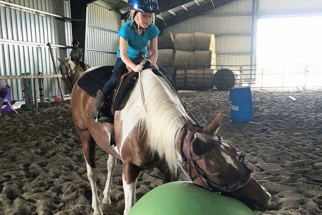 Campers spend all day doing a variety of riding and ground activities, such as roping, jumping, bareback riding, games, trust-building exercises, and more. (Photo: Partridge Horse Hill)