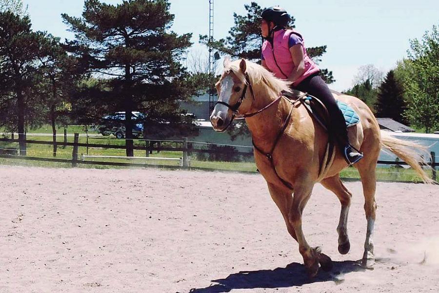 Learning to ride a horse can be empowering for children and also helps build their confidence, leadership and communication skills, and body language. (Photo: Partridge Horse Hill)