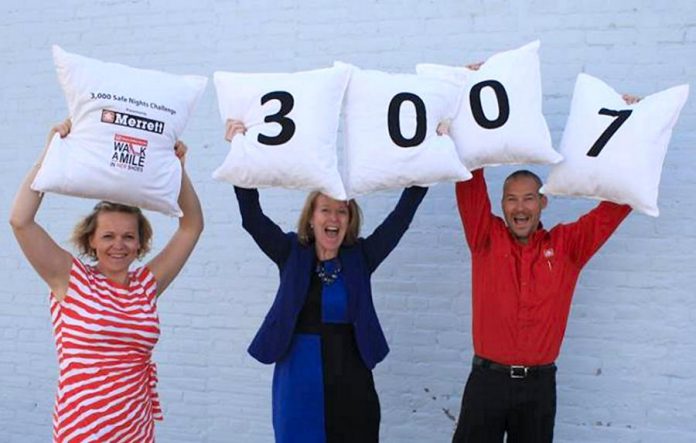 This year's YWCA Walk a Mile in Her Shoes exceeded the '3,000 Safe Nights Challenge' presented by Merrett Home Hardware Building Centre, raising $138,204.12 for Crossroads Shelter. Pictured from left to right: Jen Cureton, YWCA Director of Philanthropy & Communications; Monika Carmichael, General Manager of Trent Valley Honda and Title Sponsor of YWCA Walk a Mile in Her Shoes; and Drew Merrett, Owner of Merrett Home Hardware Building Centre and '3,000 Safe Nights Challenge' Sponsor. (Photo: YWCA Peterborough)