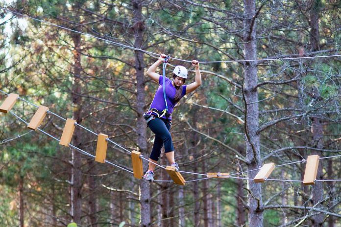 Treetop Trekking Ganaraska is an adrenaline-pumping playground of nine ziplines and 42 games or obstacles including wooden bridges, Tarzan swings, balance logs, hammock nets and tightropes as high as 70 feet above the ground, enough to excite any daring outdoor enthusiast. (Photo: Treetop Trekking Ganaraska)