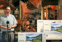 David Feeley, Senior Manager at Cogeco Connexion, which has donated 14 new televisions to The Canadian Canoe Museum. (Photo: The Canadian Canoe Museum)