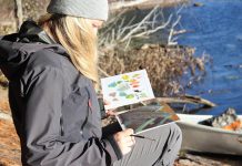 A participant in a plein air painting and paddling workshop held earlier this April. You'll be wearing summer clothes for one of the four experiences during July, August, and September offered by The Canadian Canoe Museum and The Land Canadian Adventures. (Photo courtesy of The Canadian Canoe Museum / The Land Canadian Adventures)