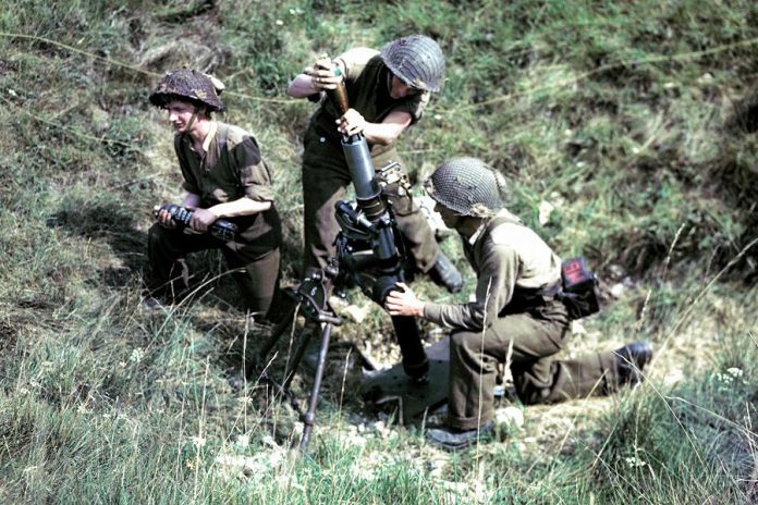 A Canadian mortar team in action in France in 1944 during World War II. (Photo: National Archives of Canada)