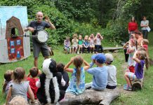 Children enjoy a performance from The Paddling Puppeteer at last year's GreenUP Ecology Park Family Night. This year, join GreenUP for a 25th Birthday Celebration and Family Night on Thursday, August 24th at Ecology Park at 1899 Ashburnham Drive in Peterborough for stream study, music, nature crafts, lantern walk, bike decorating, birthday cake, and more. (Photo: GreenUP)