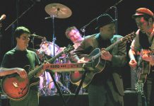 The award-winning indie rock band Rheostatics at their final show at Toronto's Massey Hall in March 2007. In 2016, original members Tim Vesely, Dave Bidini, Dave Clark, and Martin Tielli reunited and have since been writing new material and performing at special events, including Peterborough Musicfest on August 23. (Photo: Simon Law)