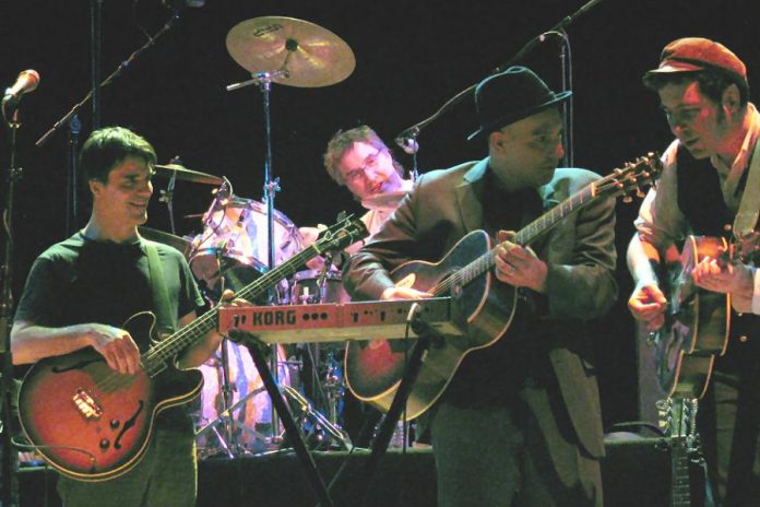 The award-winning indie rock band Rheostatics at their final show at Toronto's Massey Hall in March 2007. In 2016, original members Tim Vesely, Dave Bidini, Dave Clark, and Martin Tielli reunited and have since been writing new material and performing at special events, including Peterborough Musicfest on August 23. (Photo: Simon Law)