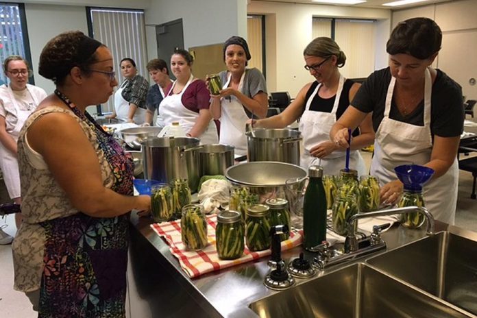 Nourish's canning workshops offer an opportunity for members of the community to learn to can in a fun, collaborative environment. (Photo: Nourish Project)