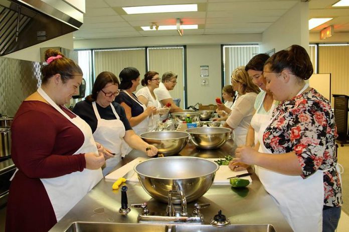 Past participants make salsa at a workshop run by Nourish. (Photo: Nourish Project)