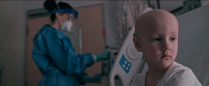 Eliza Grace Vivian during chemotherapy treatment at SickKids in a screenshot from the "Strong Heart" video. (Photo: Megan Murphy / Rob Viscardis)