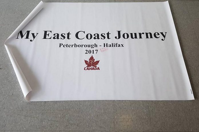 Supporter Eric Wadge gave Sutherland this banner along with some sharpies so he could collect notes from people he meets along his journey. (Photo: Eric Wadge / Facebook)