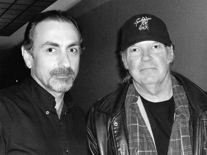 Youngtown Museum founder Trevor Hosier with Neil Young back stage at the Air Canada Centre in Toronto in 2008. The Youngtown exhibit at the Olde Gaol Museum in Lindsay is closing for good on September 10, 2017, and Hosier will be selling some of the items from his collection. (Photo: Stephen Hosier)