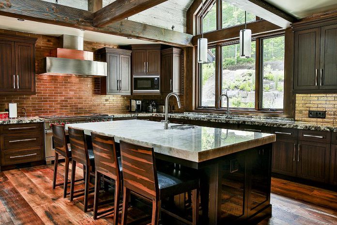 Cathy is part of a team that brings elegant and innovative design expertise and experience to clients considering anything from a bathroom remodel, to a home addition or rebuild, to a completely new custom home, or a kitchen renovation like this one. (Photo: Gilbert + Burke)