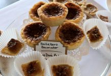 On Saturday, September 23rd, local tart makers will face off in the fifth annual Butter Tart Tour Taste-Off in Peterborough. Pictured is the Bailieboro Baconator, a bacon-enhanced butter tart by Diane Rogers of Doo Doo's bakery. (Photo: Eva Fisher / kawarthaNOW)
