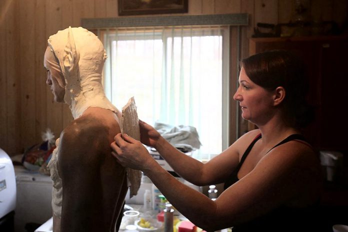 Rhonda Causton applies a prosthetic to actor Jarrett Siddall, who plays the resurrected evil fairy. (Photo: Bokeh Collective)