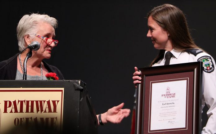 Margaret Spencley-Miller accepts the Pathway of Fame honour from Peterborough Fire Services for her late father Earl Spencely, a florist who lost his life as a volunteer firefighter battling a blaze at the Zack's Building in downtown Peterborough in 1951. (Photo: Sean Bruce, Freelance Photographer)