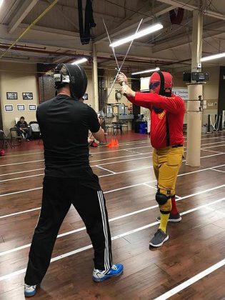 Head Coach Scott Nichols, left, and Ottawa swordplay instructor Craig Shackleton, right, give a longsword demonstration. German longsword fighting has become a revival of a once-forgotten ancient European martial art with timed bouts and complex rules. (Photo: Peterborough Multi-Sport Club)