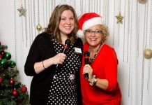 Susan Dunkley (right) is a long-time member of the Women's Business Network of Peterborough and often called upon to lead (and emcee) the organization's fundraising events. Here she is with WBN member and co-emcee Meghan Moloney at the network's Christmas Gala, an annual event that raises funds for YWCA Crossroads Shelter. (Photo: WBN)