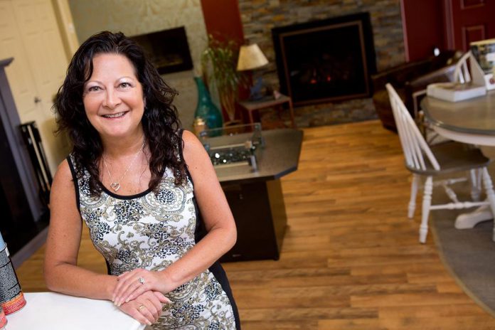 Michele Kadwell-Chalmers, founder of The Original Flame boutique fireplace company, believes a fireplace is a great way to bring your family together or to relax and let your troubles melt away.