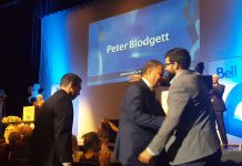 Peter Blodgett of Darling Insurance hugs his son Jeff after being named Business Citizen of The Year at the 2017 Peterborough Chamber Business Excellence Awards at Showplace Performance Centre on October 18. (Photo: Jeannine Taylor / kawarthaNOW.com)