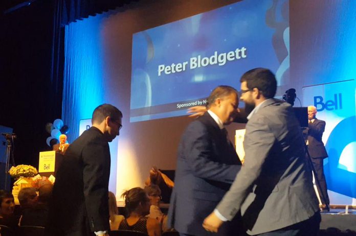 Peter Blodgett of Darling Insurance hugs his son Jeff after being named Business Citizen of The Year at the 2017 Peterborough Chamber Business Excellence Awards at Showplace Performance Centre on October 18. (Photo: Jeannine Taylor / kawarthaNOW.com)