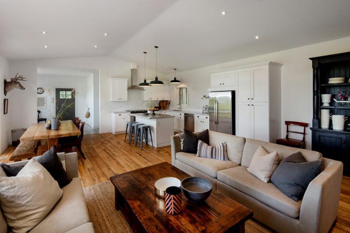 Gilbert + Burke helped the owners of an historic farmhouse in Keene achieve their preferred design: a hybrid mix of materials throughout the home, including rough-hewn wood, simple cabinetry, marble, linen, and a palette of white with a touch of grey and green. (Photo: Gilbert + Burke)