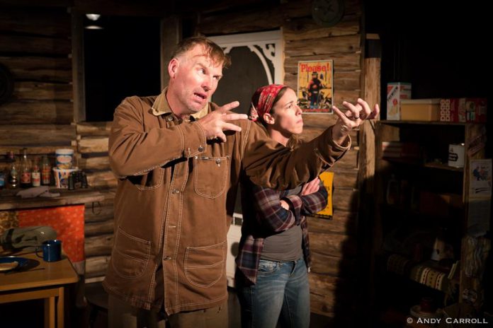 Nathan Govier as Wayne and Lindsay Unterlander as Becky in a cabin in the woods. The impressive set was created by Amy and Emily Keller and features imaginative and appropriate rustic props by Emma Meinhardt.  (Photo: Andy Carroll)