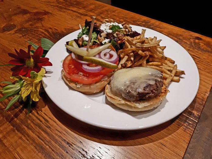 Moody's homemade hamburger with aged cheddar, fries, and a roasted beet salad. Some of the ingredients come from Circle Organic farm in Millbrook. (Photo: Moody's Bar and Grill)