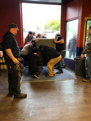 Customers and friends helping move the steam table into the new location for La Mesita Restaurant and Catering. (Photo: La Mesita Restaurant and Catering)