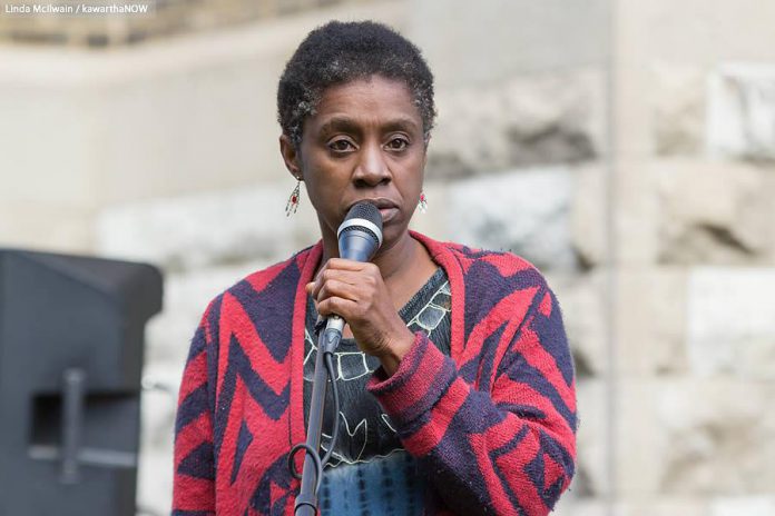 Charmaine Magumbe, chair of the Community and Race Relations Committee of Peterborough, speaks at the Solidarity Weekend. (Photo: Linda McIlwain / kawarthaNOW.com)