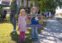 Two children with their "Love Lives Here!" sign at the Solidarity Weekend 2017 on Saturday, September 30, 2017 in Peterborough. Families participated in collective art-making with positive messages of resistance to racism and intolerance. (Photo: Linda McIlwain / kawarthaNOW.com)
