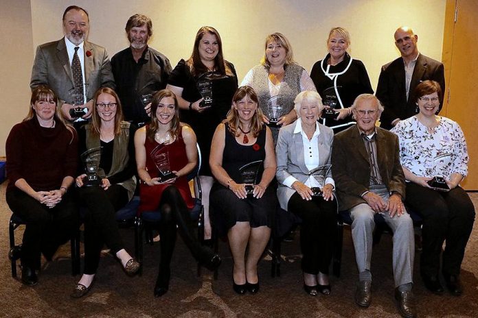 The Village of Lakefield had a strong presence among the winners of the 18th annual Kawartha Chamber of Commerce & Tourism Awards of Excellence, including Citizen of the Year Jennie MacKenzie (front row centre), Lifetime Achievement Award winners Aileen and Mike Dean (front row, second and third from right), Young Professional of the Year Erin McLean (back row, third from left), whose family business also won the Tourism or Hospitality Excellence award, and Vikki Griffin of Griffin's Greenhouses (back row, third from right), whose family business won the Outstanding Business Achievement award. (Photo: Kawartha Chamber of Commerce & Tourism)